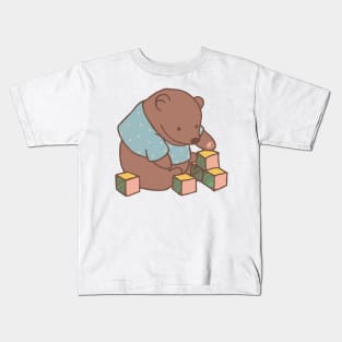 Little teddy bear plays with toys on a baby onzie or sweatshirt Kids T-Shirt